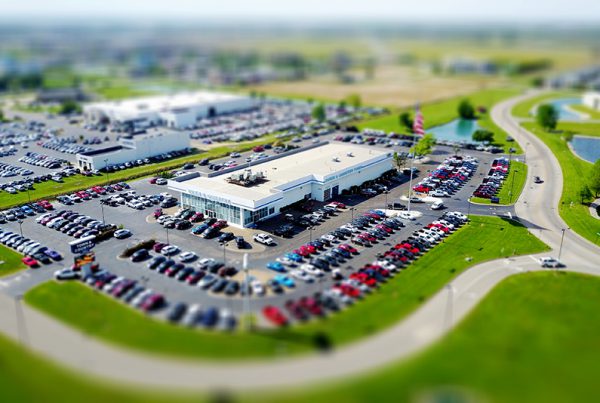 an aerial shot of a large auto dealership